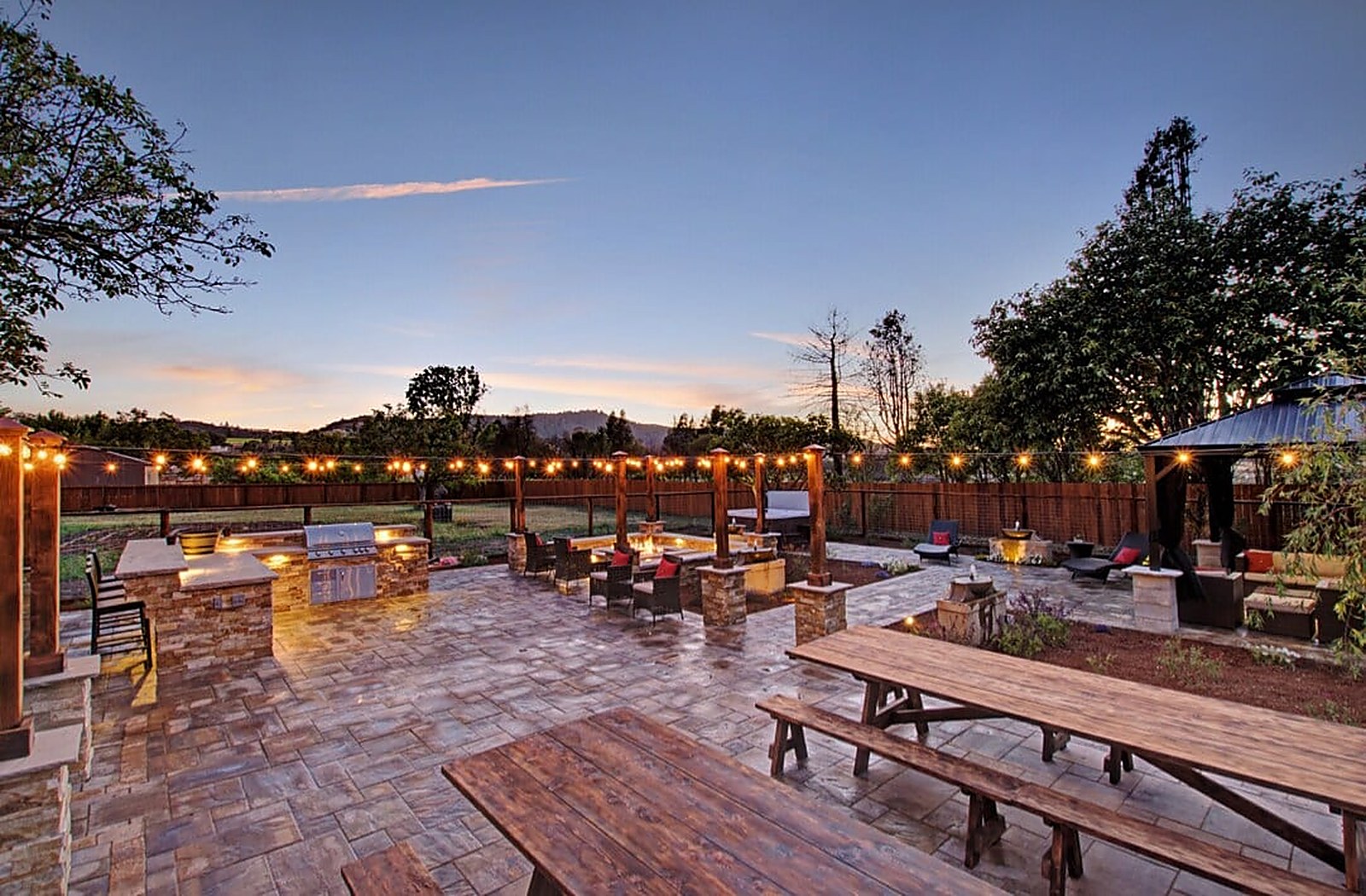 The patio and long table at sunset