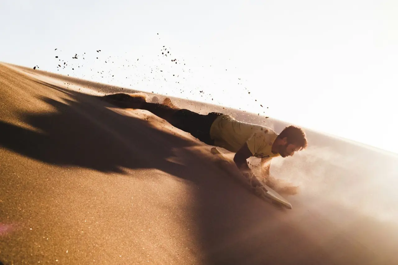 Sandboarding the Stockton dunes at Port Stephens